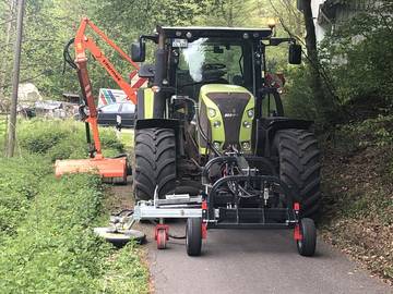 Fahrzeuge für die Grün- und Grauflächenpflege - Traktoren zum Mulchen